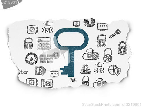 Image of Protection concept: Key on Torn Paper background