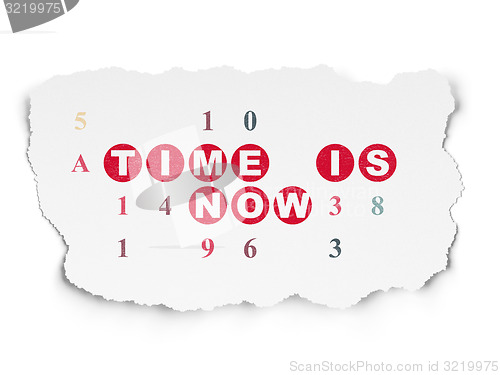 Image of Time concept: Time is Now on Torn Paper background