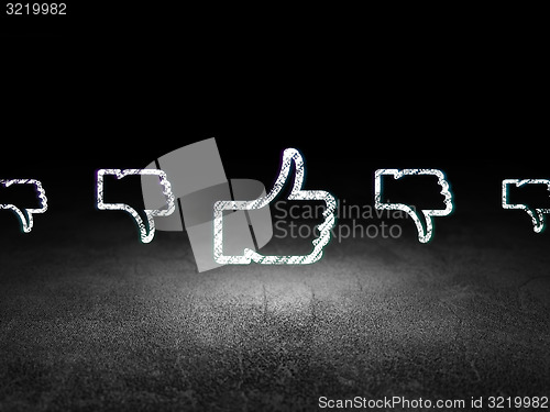 Image of Social network concept: thumb up icon in grunge dark room