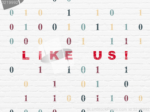 Image of Social network concept: Like us! on wall background