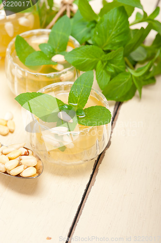 Image of Arab traditional mint and pine nuts tea