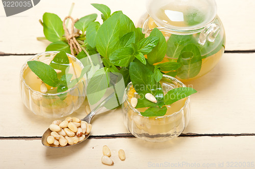 Image of Arab traditional mint and pine nuts tea