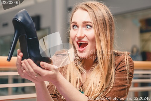 Image of Woman and shoe. Women loves shoes concept. 