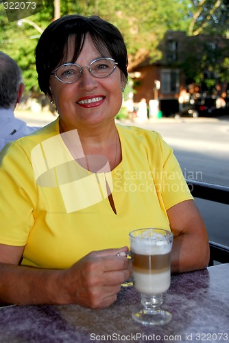 Image of Mature woman coffee