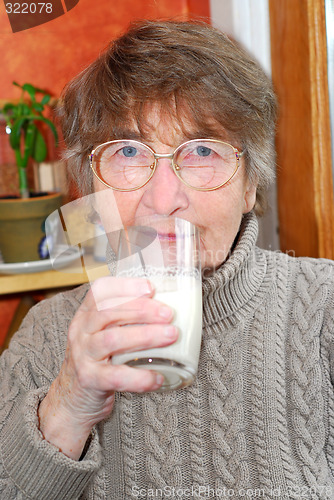 Image of Woman glass milk