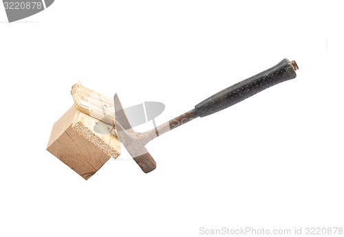 Image of Claw hammer on wood