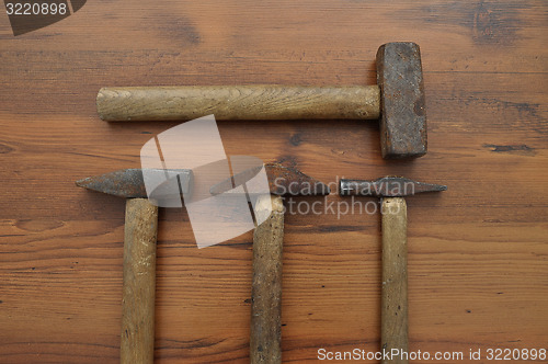 Image of Hammer on wood