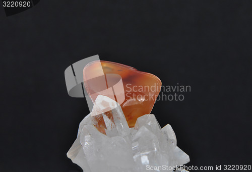 Image of Carnelian on rock crystal