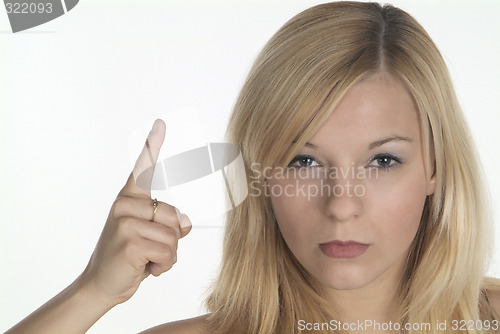 Image of woman shows finger