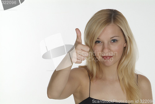 Image of woman shows thumb