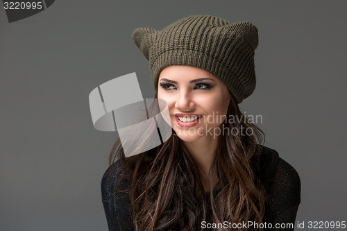 Image of Beautiful sexy young woman in a  funny hat with ears