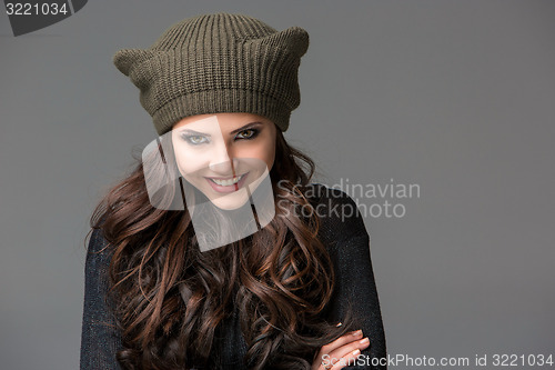 Image of Beautiful sexy young woman in a  funny hat with ears