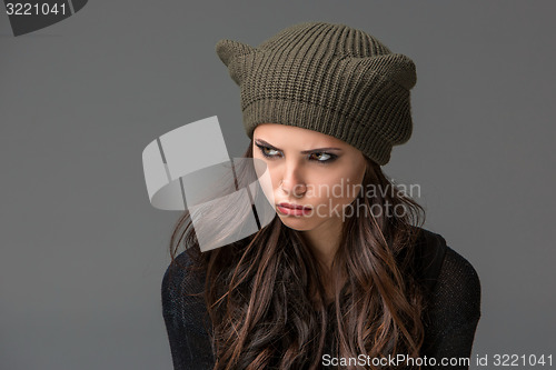 Image of Beautiful sexy young woman in a  funny hat with ears