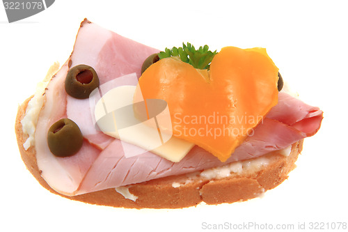 Image of open sandwich with heart 