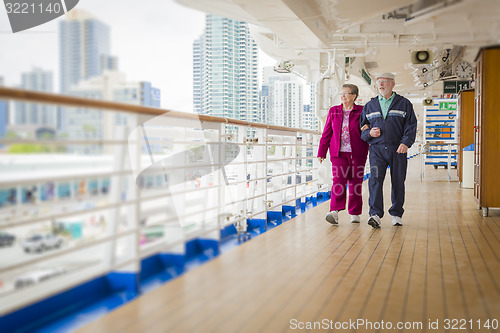 Image of Senior Couple Enjoying The Deck of a Cruise Ship