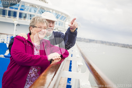 Image of Senior Couple Enjoying The Deck of a Cruise Ship