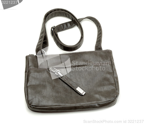 Image of Brown female handbag over white