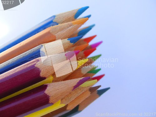 Image of crayons against a blue sky