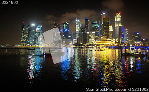 Image of Brilliantly Lit Singapore Skyline from the Harbor at Night