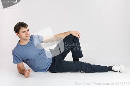 Image of Athlete resting reclining after complex of exercises
