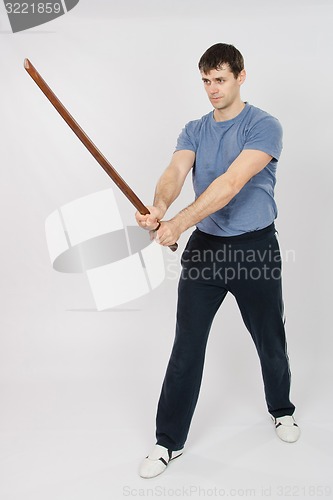 Image of Athlete configured to perform snowcock stick