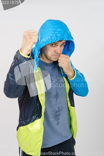 Image of Man in sportswear fights