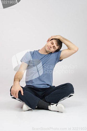Image of Athlete flexing muscles of the neck