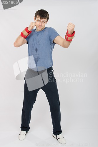 Image of Growth portrait of boxer worked blows with weighting