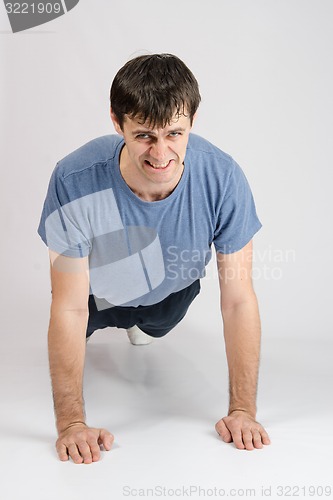 Image of Tired sportsman wrung from the floor