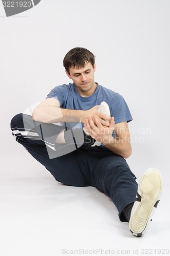 Image of The athlete performs a workout right foot