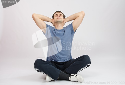 Image of Athlete stretches the muscles of back
