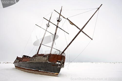 Image of Old Abandoned rusty Sailboat
