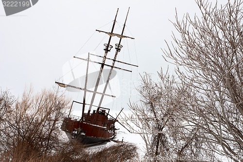 Image of Old Abandoned rusty Sailboat
