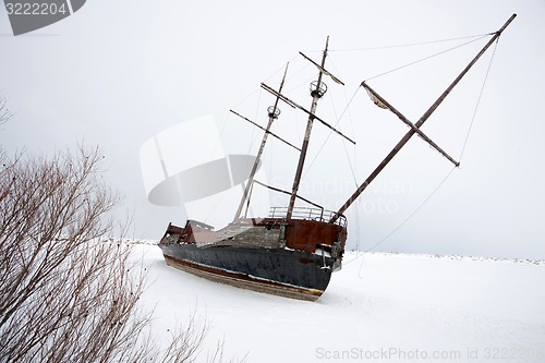 Image of Old Abandoned rusty Sailboat