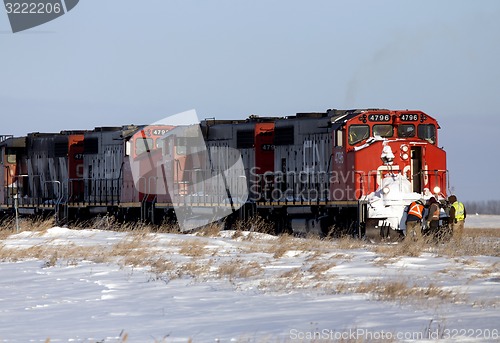 Image of Men working on Train