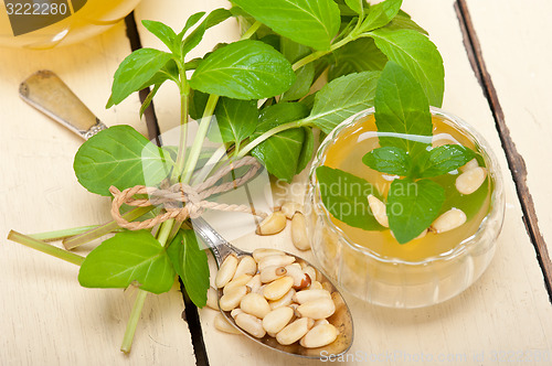 Image of Arab traditional mint and pine nuts tea