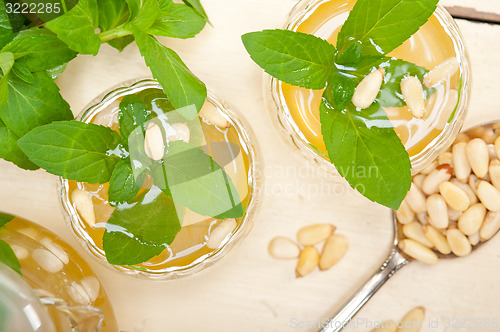 Image of Arab traditional mint and pine nuts tea