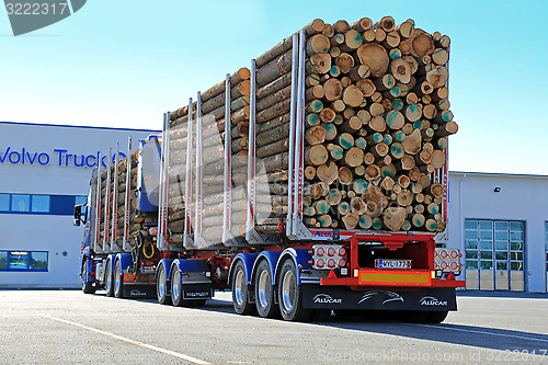 Image of Volvo FH16 700 Logging Truck on a Yard, Back View