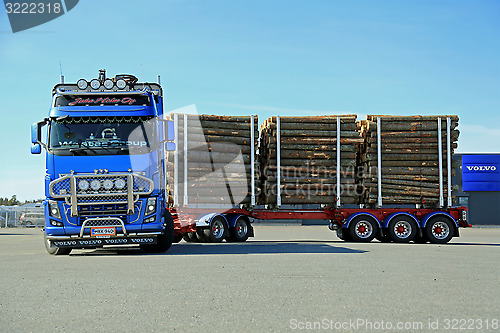 Image of Volvo FH16 700 Logging Truck Moving on a Yard