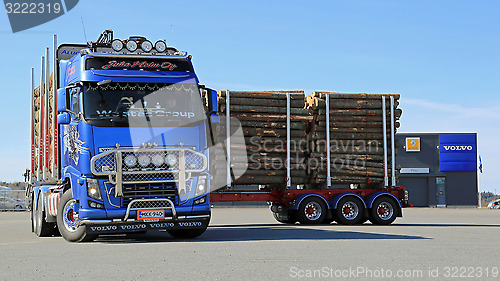 Image of Volvo FH16 700 Logging Truck Moving on a Yard