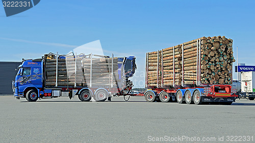 Image of Volvo FH16 700 Logging Truck Moving on a Yard