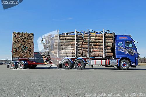 Image of Volvo FH16 700 Logging Truck Moving on a Yard