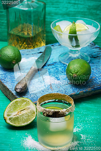 Image of refreshing cocktail made of rum and lime with ice