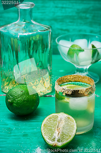 Image of refreshing cocktail made of rum and lime with ice