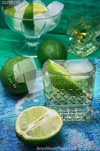 Image of refreshing cocktail made of rum and lime with ice