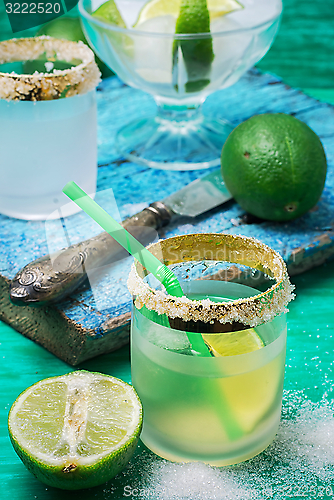 Image of refreshing cocktail made of rum and lime with ice