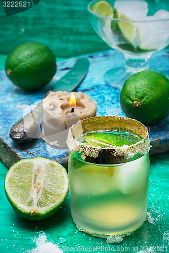 Image of refreshing cocktail made of rum and lime with ice