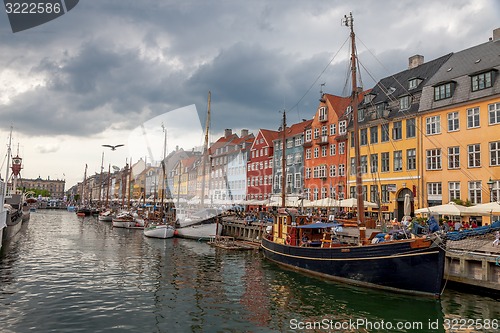 Image of The boats and ships in the calm hurbour of Nyhavn, Copenhagen, Denmark. Nyhavn  