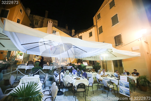 Image of People sitting in restaurant 