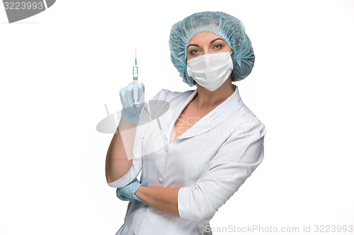 Image of Portrait of lady surgeon showing syringe over white background